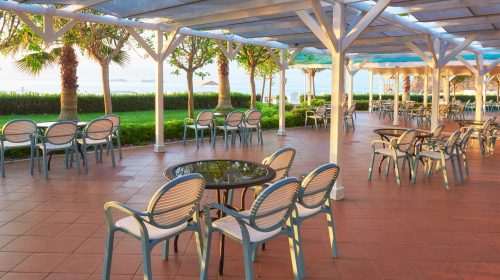 Summer restaurant on the Mediterranean coast on a beautiful sunset. Tekirova-Kemer. Turkey